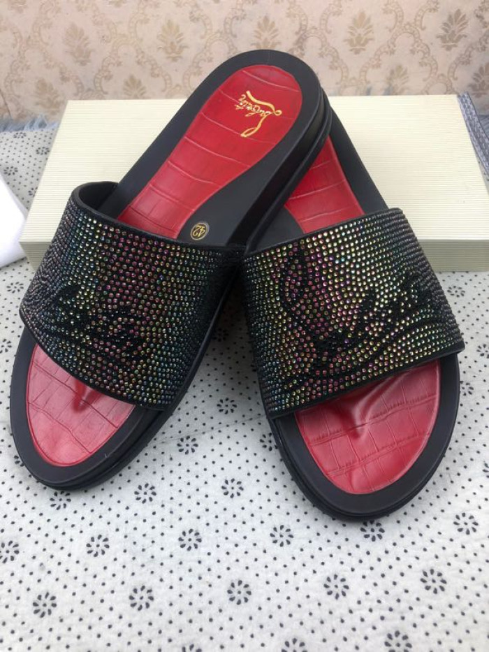 CHRISTIAN LOUBOUTIN SLIPPERS